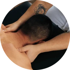 Man receiving a shoulder and back massage