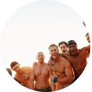 A group of men laughing together outdoors