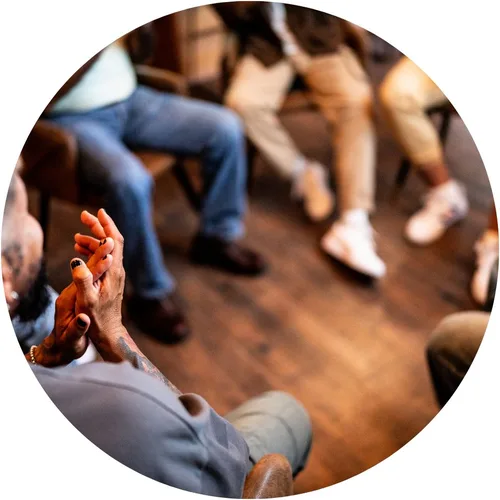 Men sitting together in a workshop circle